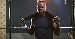 Portrait, fitness and man with towel for gym training, exercise break and commitment for body goals. Workout routine, sweat cloth or athlete with rest for wellness, bodybuilding pause or sports club