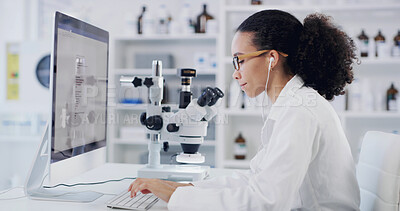 Buy stock photo Earphones, scientist and woman with computer in lab for research, drug development and typing. Music, science and person with tech for medical innovation, pharma study or listen to audio with screen