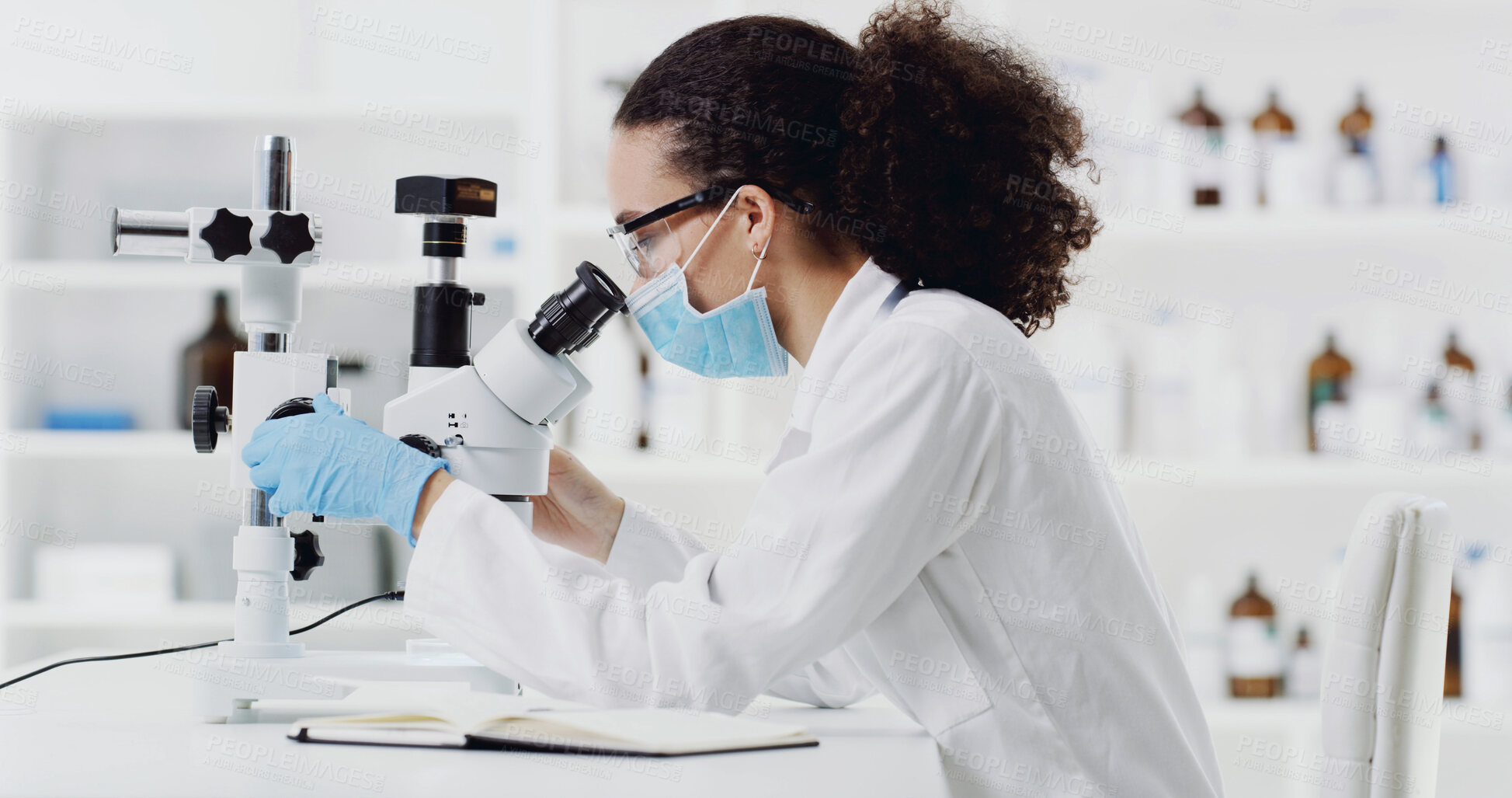 Buy stock photo Research, scientist and woman with microscope in lab for experiment, drug development and test. Mask, science and person with microbiology equipment for medical innovation, pharma study or analysis