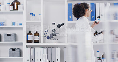 Buy stock photo Science, woman and reading bottle in lab with clipboard, review and medical research for drug trial. Scientist, person and product in clinic with checklist, stock inspection and quality assurance.