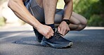 Hands, lace tie and man in street, fitness and sneakers for comfort, challenge and exercise. Routine, person and runner with wellness, shoes and workout for health benefits, athlete and practice