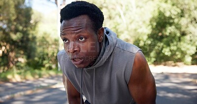 Buy stock photo Tired, black man and outdoor with sweat from cardio workout, exercise challenge and sports fatigue. Exhausted person, breathe and fitness in road with training break, rest and recovery for wellness.