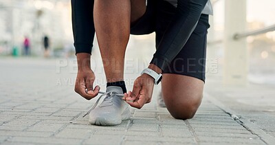 Buy stock photo Person, hands and tying with shoes for fitness, workout preparation or outdoor exercise. Active, runner or getting ready with sneakers or laces for physical activity, health and wellness on promenade