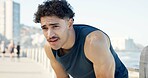 Tired, man and sweat in city with fitness break, difficult endurance challenge and sports fatigue. Exhausted, person and rest outdoor with workout recovery, stop exercise and training for wellness.