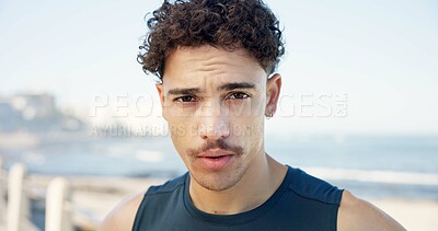 Buy stock photo Man, portrait and fitness on beach promenade with space, sky and confident for wellness in summer. Person, runner and pride with break for exercise, rest or tired with breathing at seaside in Brazil