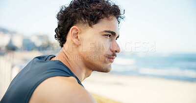 Buy stock photo Athlete, thinking and man at beach, rest and thoughtful on break after exercise routine and serious. Outdoor, runner and person in nature, reflection and fitness with workout, remember or space
