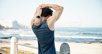 Buy stock photo Stretching, runner and back of man by ocean to start workout, exercise and training outdoor. Fitness, athlete and person on promenade with warm up for mobility, wellness and ready for active hobby