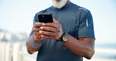 Buy stock photo Old man, hands and fitness outdoor with phone, social media post and notification for wellness app. Senior person, typing and tech on promenade with text message, exercise website and workout break.