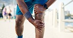 Person, knee injury or promenade with pain for fitness, workout accident or emergency. Active, runner or sore leg with ache, strain or pressure for joint inflammation or fibromyalgia in an urban town