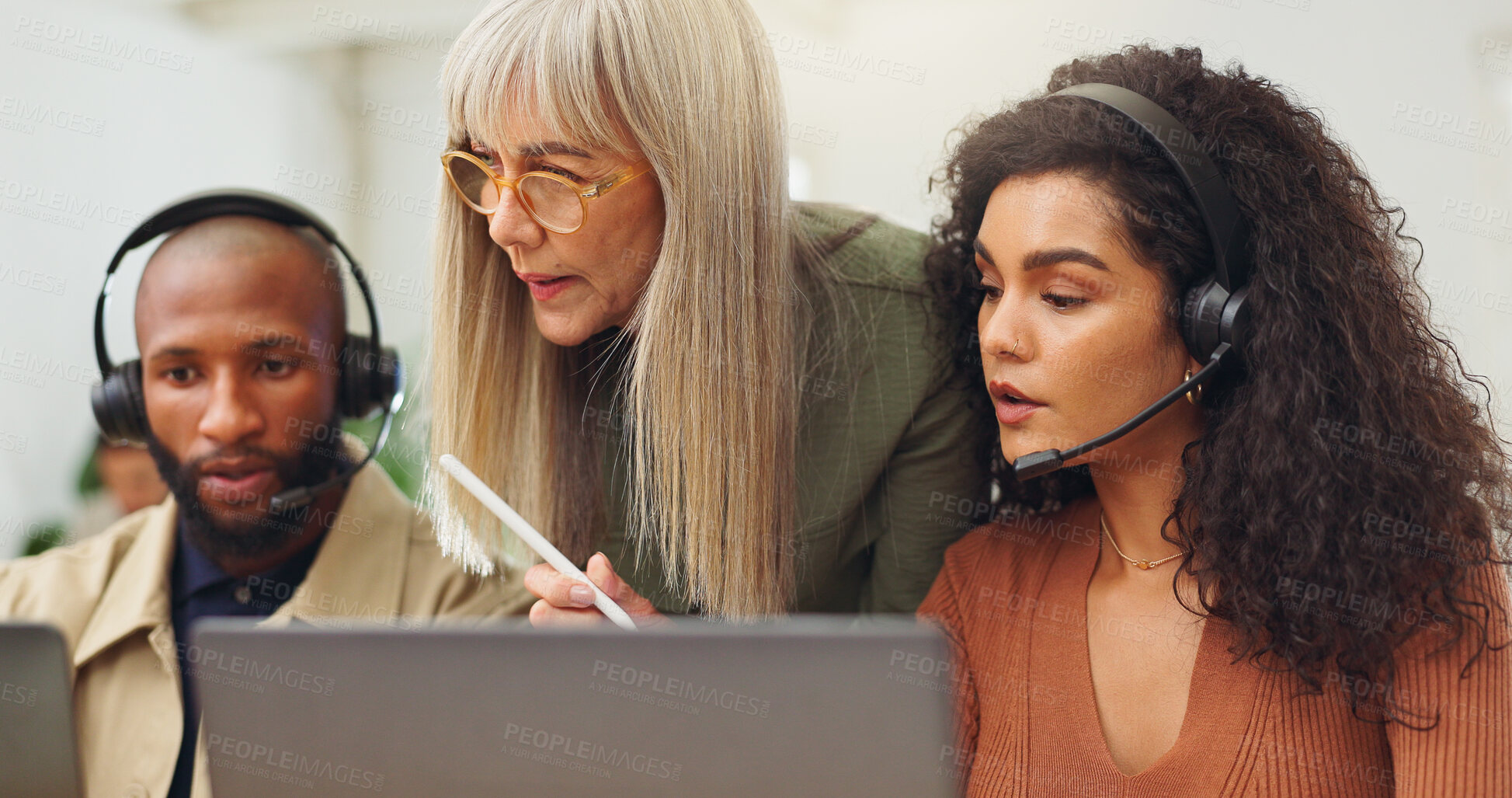 Buy stock photo Call center, discussion and group with headset, laptop and mentor with advice, online and coworking. Telemarketing, consultant and people with technology for communication, mic and help for sales