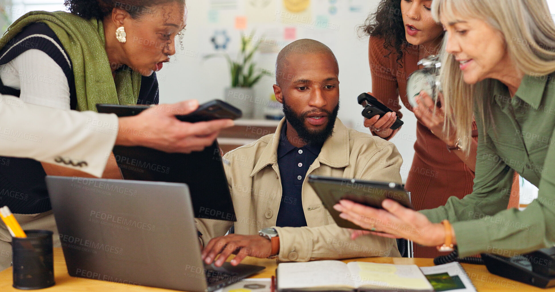 Buy stock photo Man, team and crisis with laptop at office for deadline, multitasking and stress for time management. Person, group and frustrated with chaos, report or overwhelmed with project at creative agency