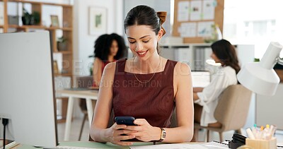Buy stock photo Woman, smile and typing in creative agency with phone, social media management or search for trend. Person, coworking or tech in office for campaign post, online brand awareness or digital marketing.
