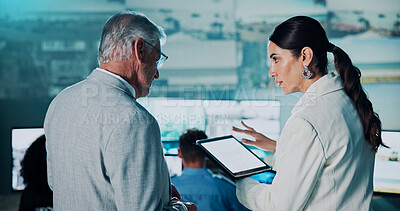 Buy stock photo People, security and talking with tablet in control room for surveillance, cctv footage and alert. Mature man, woman and digital for satellite update, monitor worldwide or mockup space for protection
