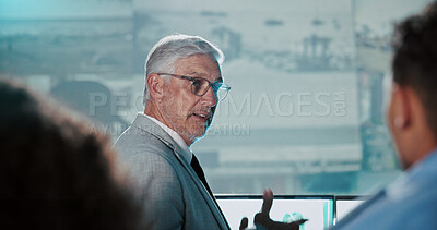 Buy stock photo Man, private investigator or discussion with team in control room for security surveillance. Mature person, officer or inspector with cctv footage for safety breach, protocol or precaution in office