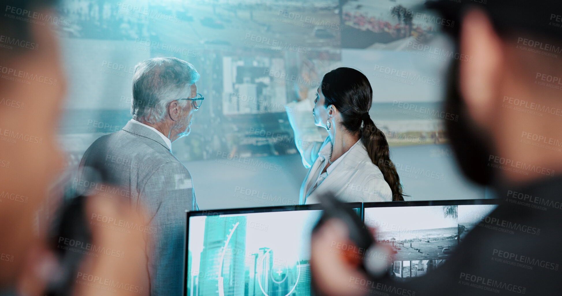 Buy stock photo People, security team and discussion with surveillance for monitoring safety in control room. Man, woman or private investigation with technology for protocol measure, cctv footage or coverage plan