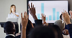 Presentation, audience and business people with hands raised for conference, training and meeting. Speaker, discussion and questions in workshop, convention or seminar for financial coach with graph