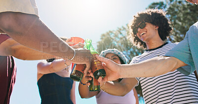 Buy stock photo Hands, friends and drinks cheers outdoor for reunion celebration, social gathering or bonding. Below, people or alcohol toast in nature for friendship appreciation, group achievement or weekend party