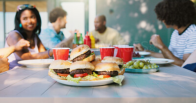 Buy stock photo Hamburger, bbq and relax with friends outdoor for social reunion, lunch and beef. Nutrition, party event and barbecue cookout with group of people eating food in backyard of home for holiday