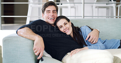 Buy stock photo Watching tv, couple and hug on break, laugh and bonding with movies, love and affection with partner. Home, rest and streaming comedy on weekend, man and embrace with woman or entertainment in lounge