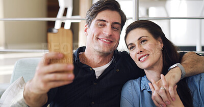 Buy stock photo Happy couple, selfie and hug on sofa in home with bonding, connection or care with web post. Man, woman and smile with partner, photography or embrace with love for social media on couch at apartment