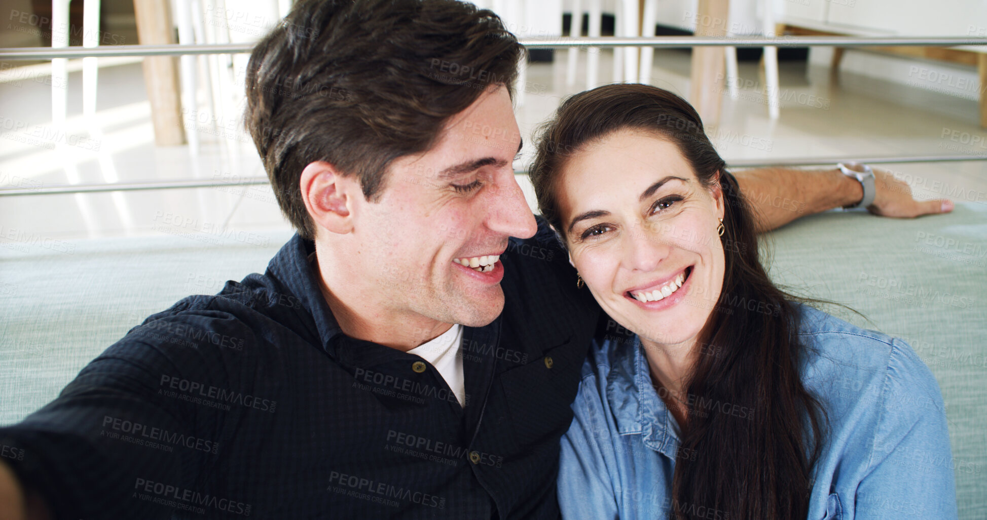Buy stock photo Smile, selfie and happy couple on couch, portrait and profile picture for memory, relax and funny. Home, man and woman in lounge, social media post and photography with love, laughing and romance