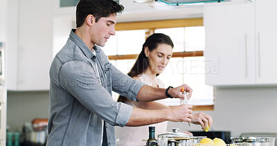 Buy stock photo Recipe, cooking and couple in kitchen, help and bonding together for relationship, vegan dinner and talking. Home, ingredients and man with woman, support and prepare meal for nutrition and diet plan