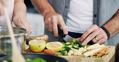 Buy stock photo Vegetables, cutting and hands of couple in kitchen for nutrition, bonding and healthy cooking. Food, support and marriage with man and woman helping at home for meal prep, love and wellness together