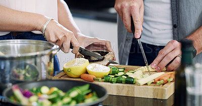 Buy stock photo Vegetables, cooking and hands of couple in kitchen for nutrition, bonding and health. Food, support and marriage with man and woman helping at home for meal prep, dinner and wellness together