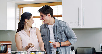 Buy stock photo Home, cooking and couple in kitchen, funny and bonding together for relationship, recipe and humor. Laughing, ingredients or man with woman, diet plan and prepare meal for nutrition, smile or excited