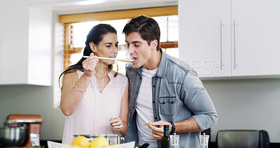 Buy stock photo Home, cooking and couple in kitchen, tasty and bonding together for relationship, hungry and help. Delicious, organic ingredients and man with woman, diet plan and prepare meal for nutrition and love