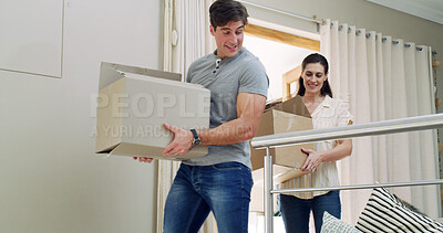 Buy stock photo Walking, happy and couple with boxes in new home for moving to property, apartment and house. Homeowner, relocation and man with woman excited for real estate investment, purchase and mortgage