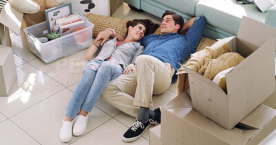 Buy stock photo New home, above and couple with discussion for decoration and ideas for interior design. Apartment rental, man or woman on floor, boxes or conversation for property investment, goals or real estate