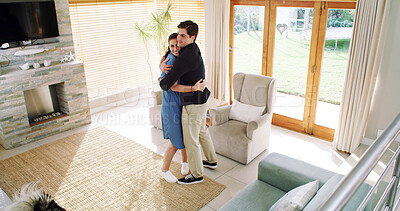 Buy stock photo Hug, happy couple and dancing in lounge, above and bonding together for love, care and marriage. Home, man and woman in living room, embrace and movement for celebration, comfort and relationship