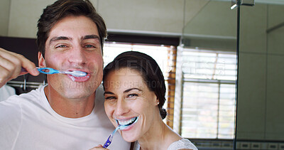 Buy stock photo Funny, brushing teeth and couple in bathroom, portrait and dental wellness for fresh breath. Home, man and toothbrush for oral health, woman and routine for hygiene, mouth care and laughing for humor