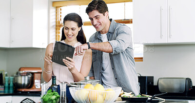 Buy stock photo Home, cooking and happy couple in kitchen, tablet for online recipe and app for food website. Nutrition, man and tech for social media, woman and reading instructions for health meal and ingredients