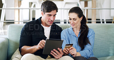 Buy stock photo Talking, credit card or couple on sofa, tablet for ecommerce or website info for home insurance. Purchase, man or woman on couch, transactions or tech for online shopping or payment for discount deal