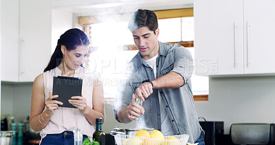 Buy stock photo Wellness, cooking and happy couple in kitchen, tablet for online reading and app for ingredients. Home, man and tech for recipe checklist, woman or instructions for meal prep or website for nutrition