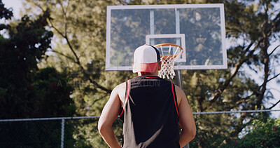 Buy stock photo Man, back view and playing on basketball court for score, point or outdoor match in nature. Active, low angle of person or preparation with aim or technique for game, shot or sport fitness on pitch