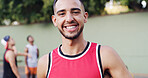 Portrait, man and smile on basketball court for fitness game, exercise and match practice. Happy, male person and confident for sports training, endurance workout and skill development for tournament