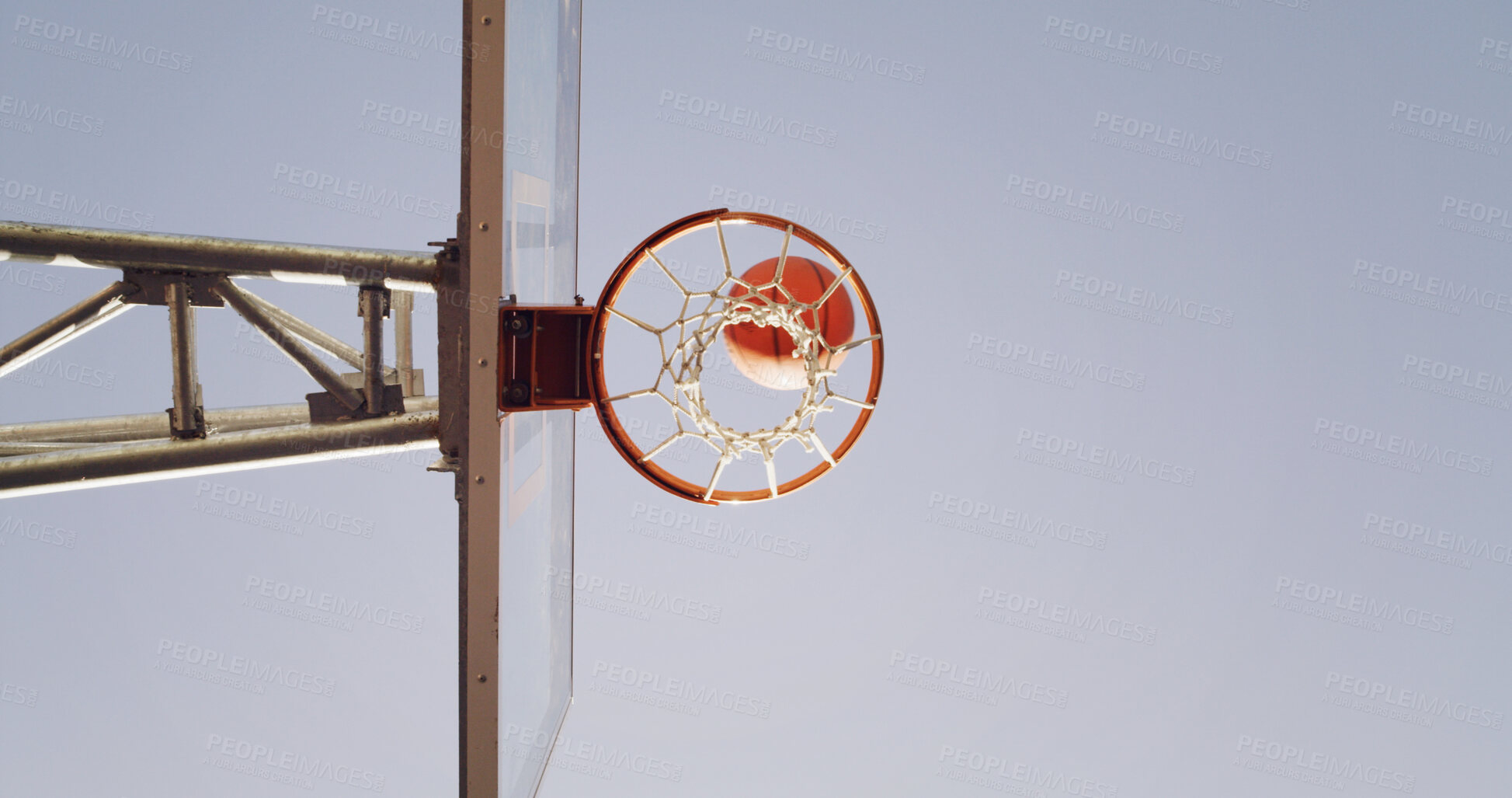 Buy stock photo Below, basketball and net outdoor with score, goal success or shooting skill for winning competition. Mockup space, hoop and point in sports game with victory, target achievement and tournament goal.
