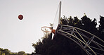 Shooting, basketball and net outdoor with target, competition game and practice skill for tournament. Hoop, free throw shot or sports contest with board, aim and training goal for match at low angle.