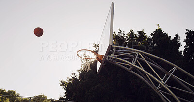 Buy stock photo Shooting, basketball and net outdoor with target, competition game and practice skill for tournament. Hoop, free throw shot or sports contest with board, aim and training goal for match at low angle.