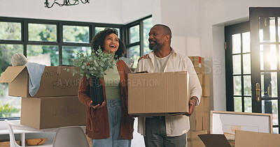 Buy stock photo Moving in, couple and surprise with dream home, box and plants for relocation in property investment. African man, woman and new house with mature people, excited homeowner and wow for real estate