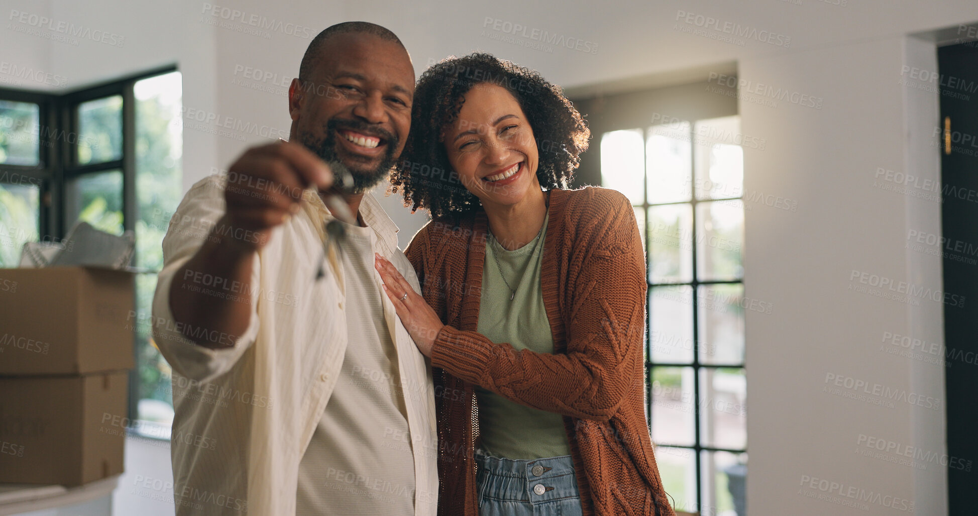 Buy stock photo Keys, portrait and mature couple in new home with bonding, happiness and love in marriage. Hug, smile and man with woman for relationship with property investment together for moving at real estate.