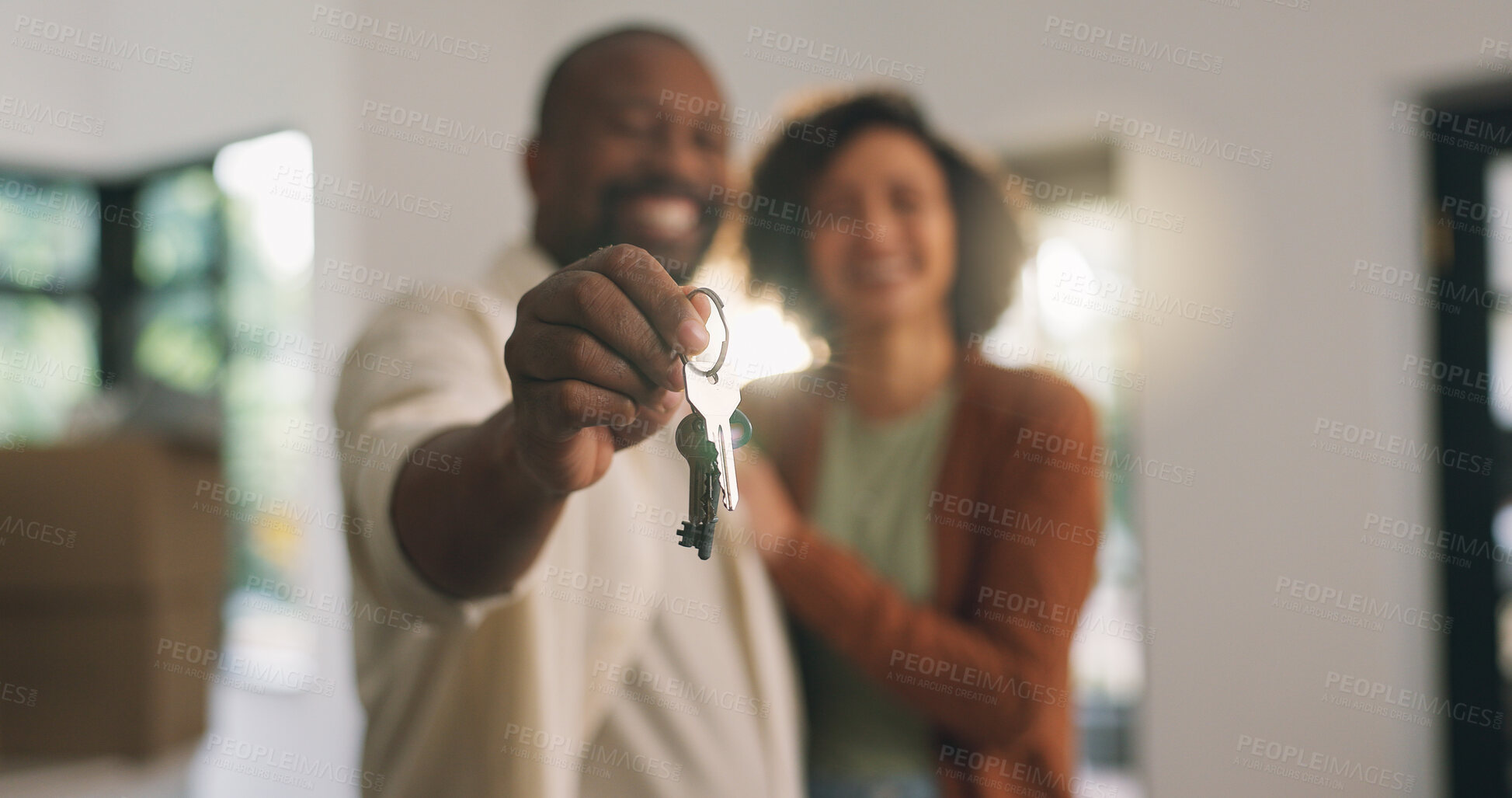 Buy stock photo Keys, hand and mature couple in new home with bonding, happiness and love in marriage. Hug, smile and man with woman for relationship with property investment together for moving at real estate.
