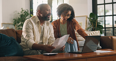 Buy stock photo Mature couple, document and laptop in home with discussion, online bills and website for mortgage loan. Married black people, talk and paperwork in house with computer, expenses or insurance invoice.