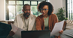 Reading, paperwork and couple with laptop on sofa, budget planning or track expenses for savings. Banking, income statement or mature African people with mortgage payment, bills review or pc in home