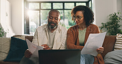 Buy stock photo Discussion, document or couple with laptop on sofa, budget planning or track expenses for savings. Talking, income statement or mature African people with mortgage invoice, review bills or pc in home