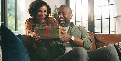 Buy stock photo Surprise, gift box and mature couple on sofa in home for valentines day, anniversary or romance. Happy, wow and woman with present for man with celebration together in living room at apartment.