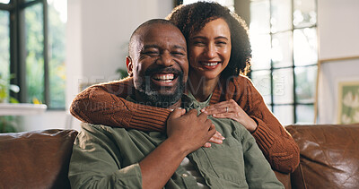 Buy stock photo Portrait, mature couple and hug in house with smile, love and connection for bonding together on weekend. Happy, black people and embrace in living room with marriage commitment, trust and support.